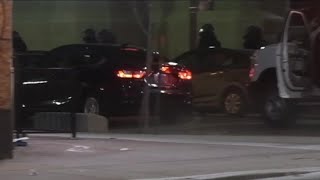 Driver plows into Denver police vehicle injuring officers, civilian