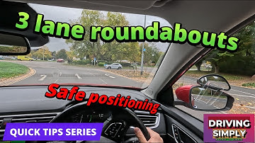 Driving quick tips 1. Keeping in your lane while going ahead at a 3 lane roundabout, NO LANE DIVIDER