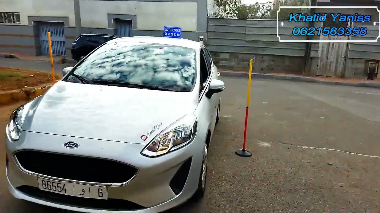 الدرس 107 : ركن السيارة أو الدخول إلى الكراج بالرجوع الى الخلف