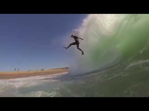 Insane Wipeout! Bodyboarder falls out of the sky and almost lands on dry sand.