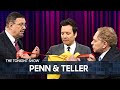 Penn  teller add their own twist to a classic donut and ribbon trick  the tonight show