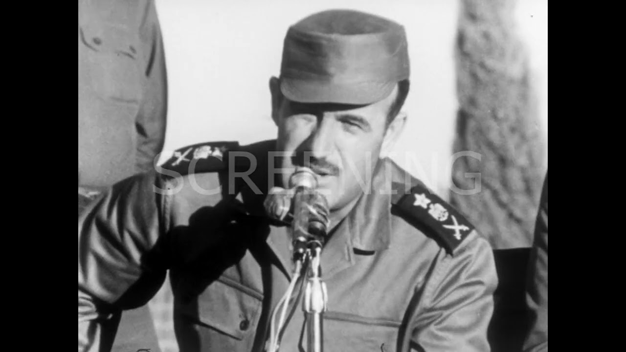 Min of Defense Hafez al-Assad and Mustafa Tlass visiting combat units and giving a speech