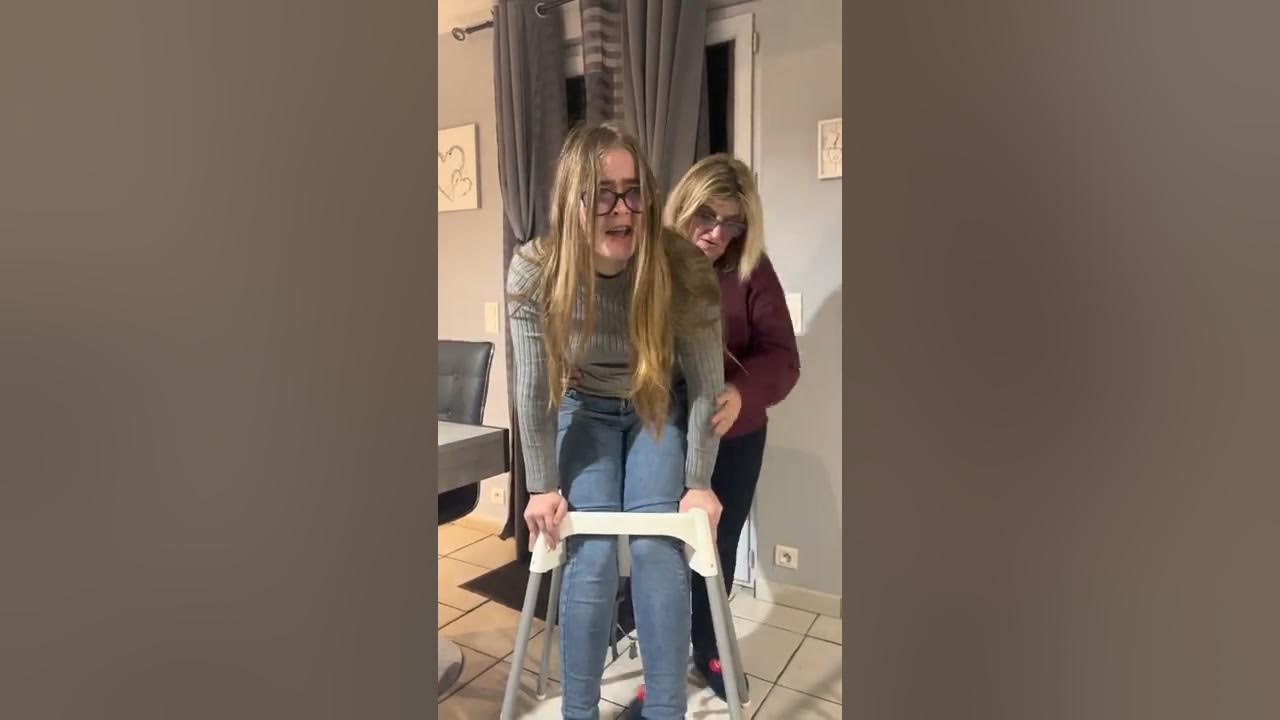 Girl Gets Stuck in Baby Chair While Attempting to Fit Into It 1379465