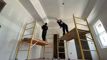 Just your two favorite sisters working on a tray ceiling!