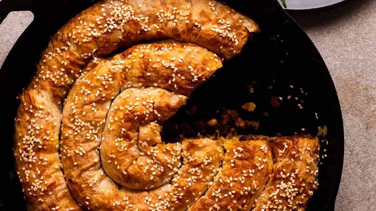 ⁣Borek - Turkish Lamb filled filo pastry spiral