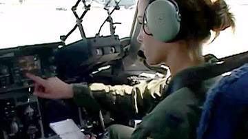 U.S. Army Paratroopers Jump Out of a C-17