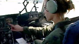 U.S. Army Paratroopers Jump Out of a C-17