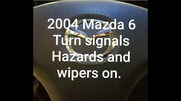Fixed Mazda 6 Turn signal or hazards turn on wipers.