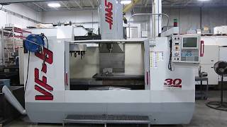 Information Haas VF-6/50 Taper CNC Vertical Machining Center with Thru Spindle Coolant and 4th Axis Drive Update