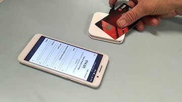Using Square, mobile phone and contactless card reader in action