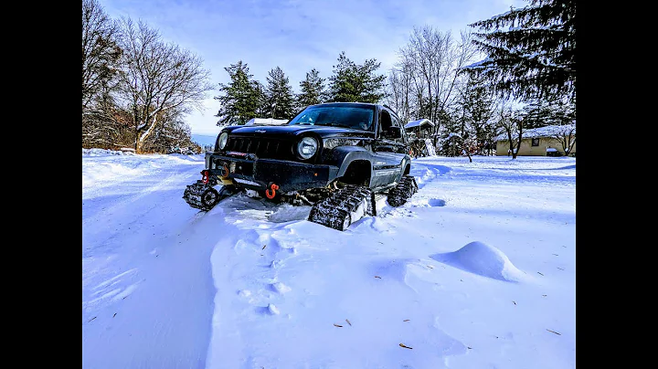 SNOW TRACKS ON A JEEP