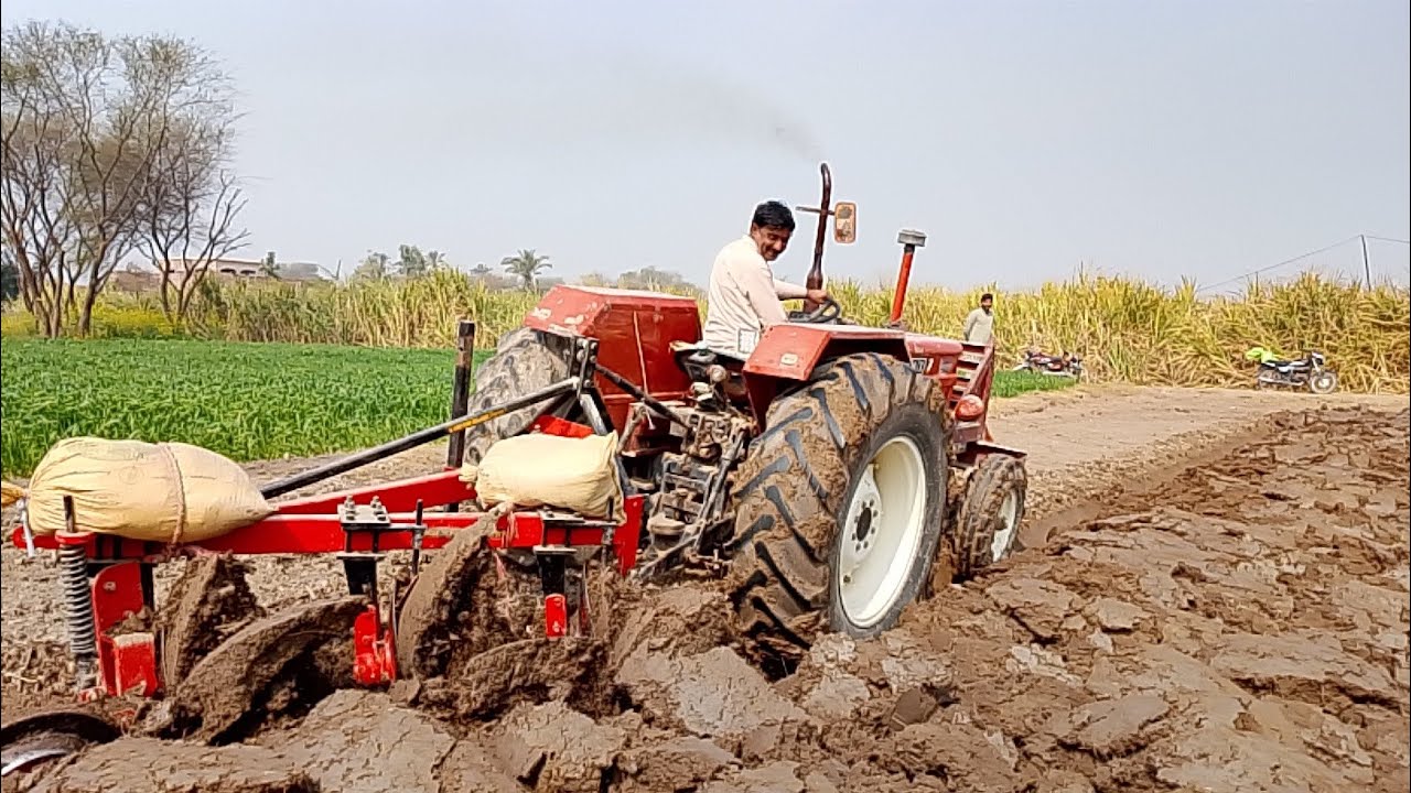 Fiat 640 on disc plough heavy load 