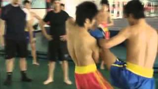 Sanda's High Roundhouse And Kick Sweep Takedown