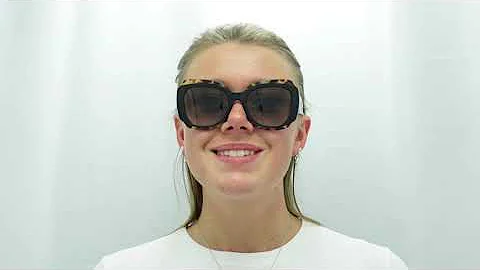 Woman model wearing Prada PR16YS 01M0A7 Sunglasses