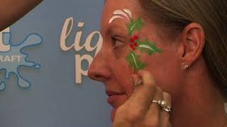 Step-by-Step how to face paint a christmas holly design using Derivan Face and body paints tutorial