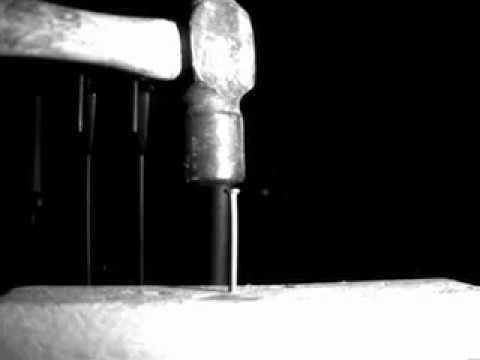 Hammer Hitting Nail