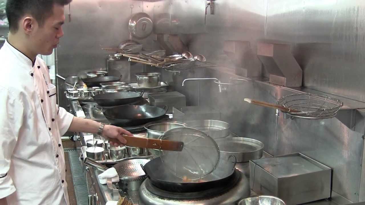 Wai Kiu prepares a dish at Nanhai No. 1 in HK