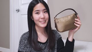 COACH Nolita Wristlet 15 In Pebble Leather in Metallic