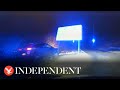 Moment driver crashes into road sign during 115mph police chase