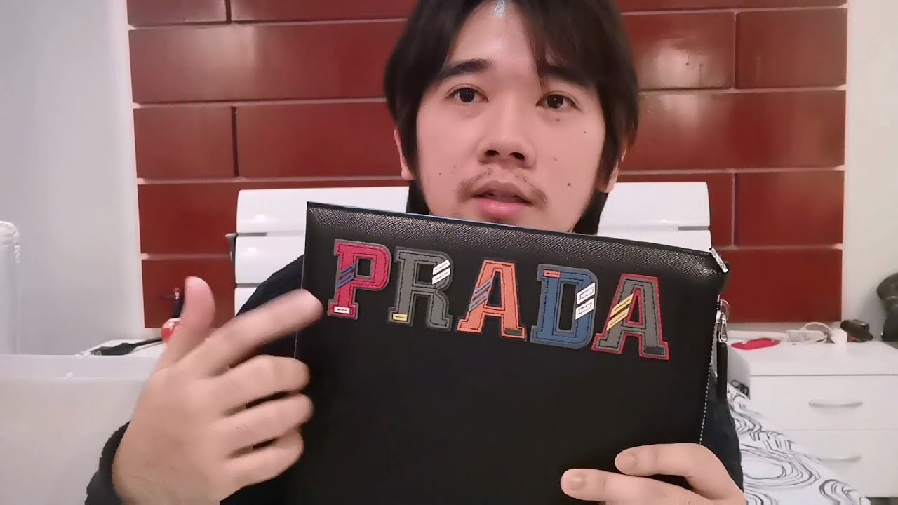 Men Prada clutch documents, Balmain hoodie unboxing