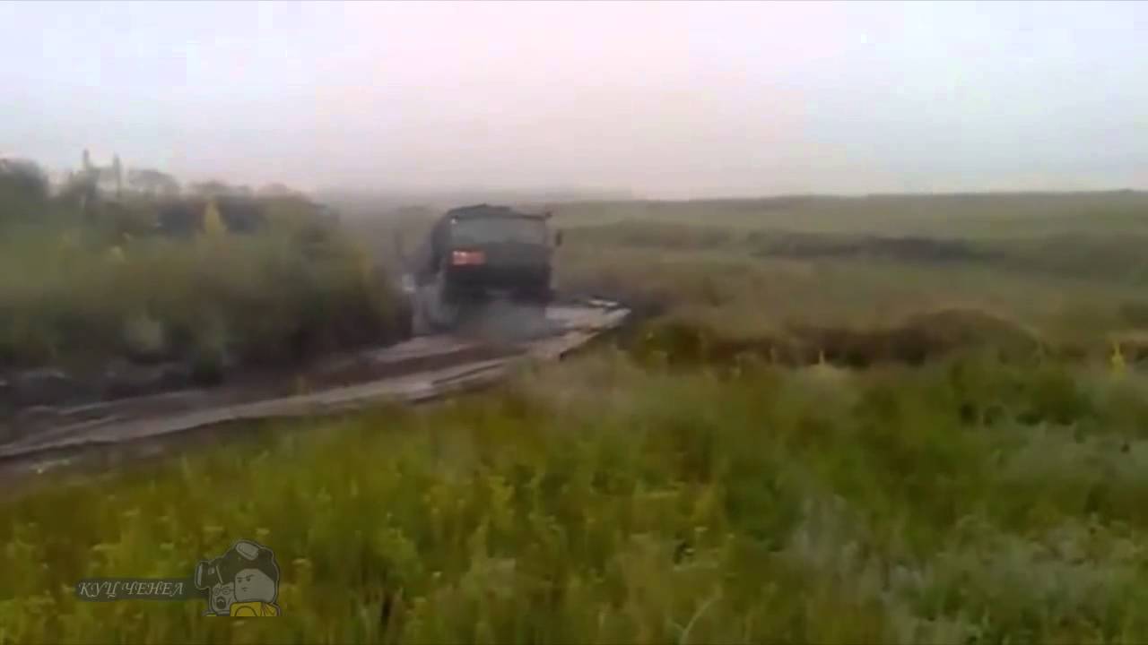 Камаз застрял в грязи Камаз застрял в грязи