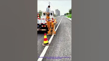 Road Safety: Sliding Rail Traffic Cone Deployer in Action