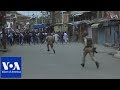 Police clash with protesters in kashmir