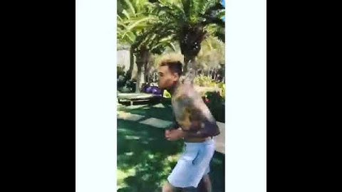 Chris brown doing 5 backflips