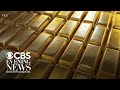 FBI finds millions in gold bars, watches, cash in former CIA official's home