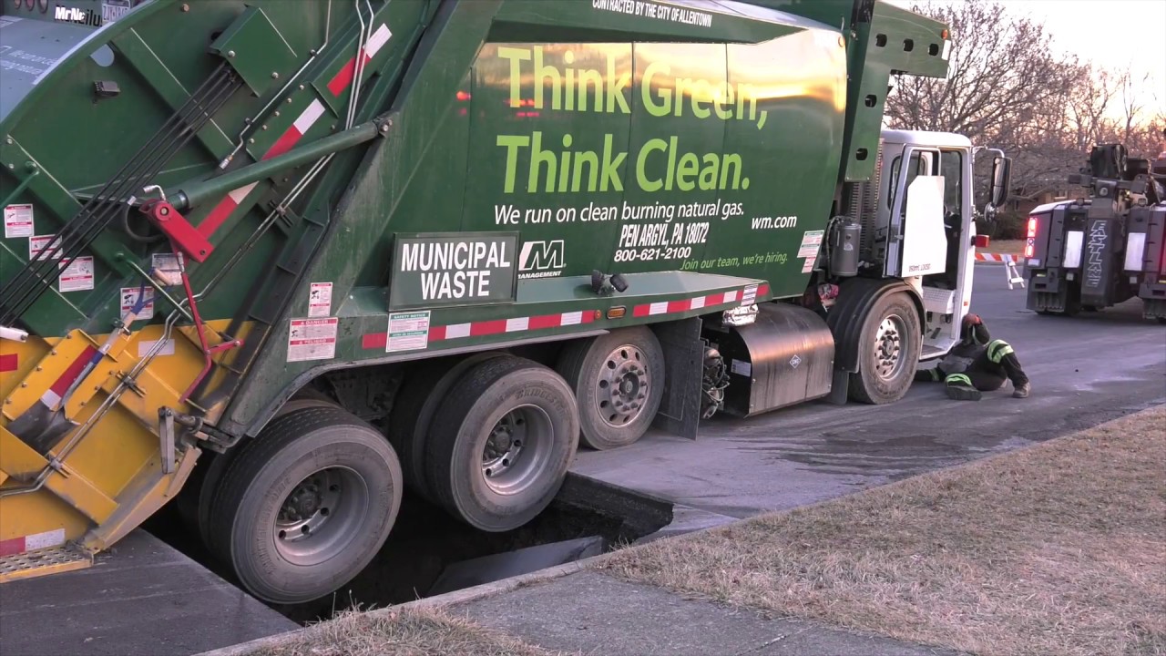 Garbage truck falls in sink hole Allentown, PA 02/21/17 YouTube