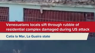 Venezuelans locals sift through rubble of residential complex damaged during US attack