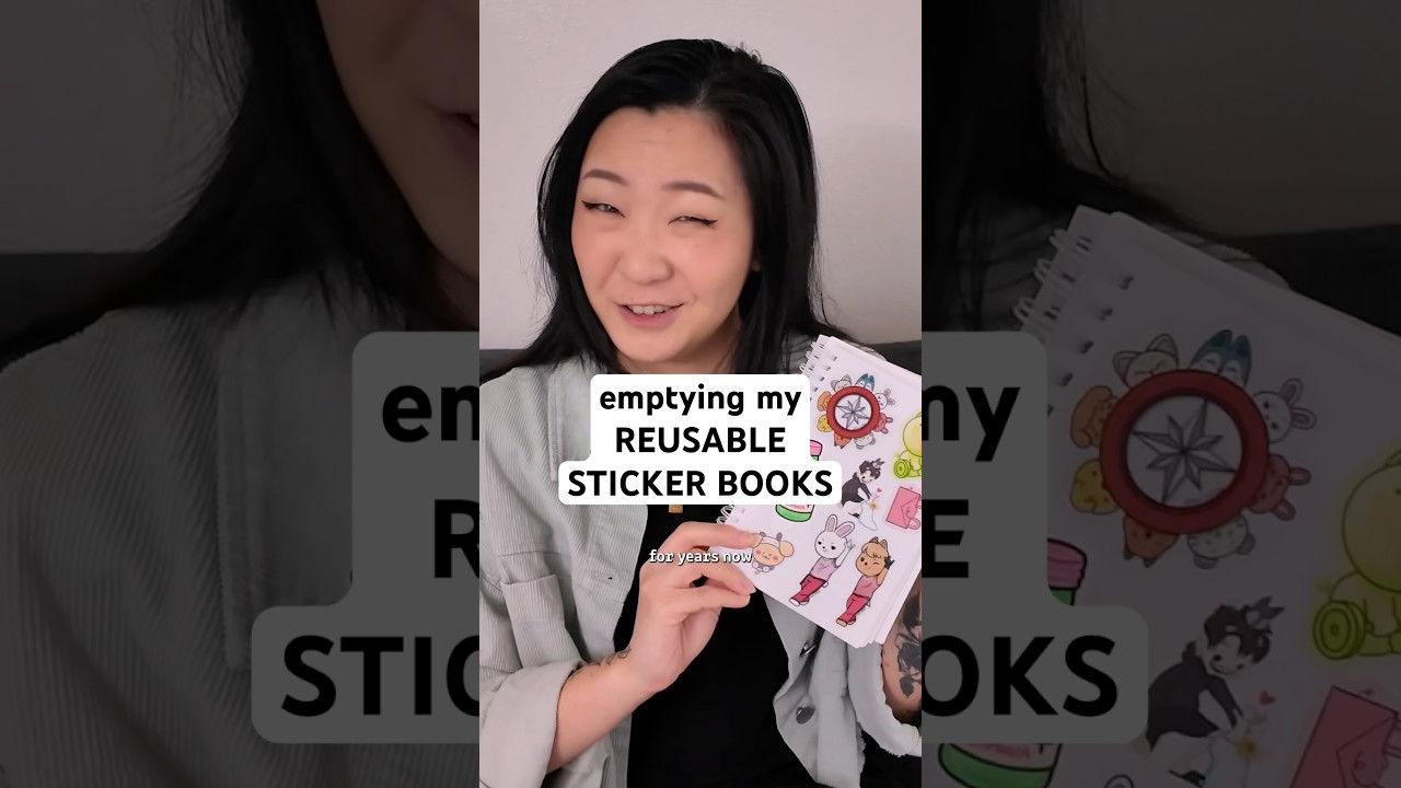 taking stickers out of my reusable sticker books 