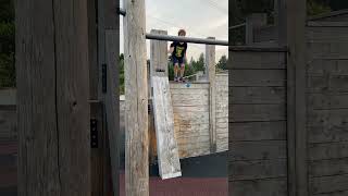 Boy jumps from ledge onto pull up bar to hang but flips and lands on back at playgroundz