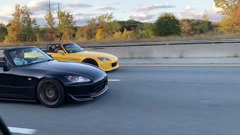S2000 F22 (black car) vs S2000 K24 (yellow car)