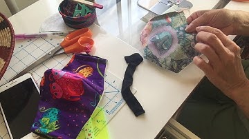 Installing the nose bridge wire on an Olson Mask