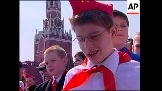 Zyuganov welcomes young recruits to the party at ceremony(1. Wide of young pioneers marching in Red Square 2. Close of young pioneers marching in Red Square 3. Wide of young pioneers marching in Red Square 4., 2015-07-28T10:19:13.000Z)