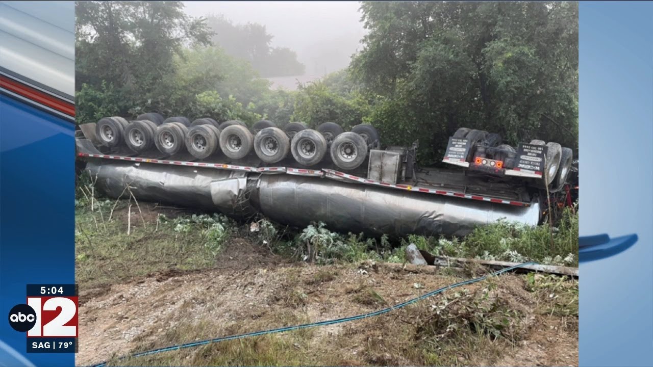 Milk tanker truck overturns and spills its load in Tuscola County - YouTube