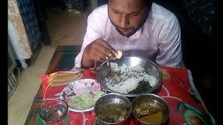 EATING RICE, FISH, SHAK BHAJA, SALAD