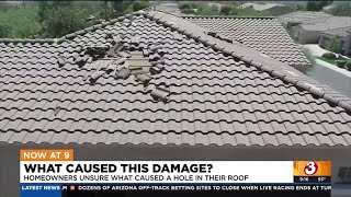 Phoenix homeowners unsure what caused hole in their roof