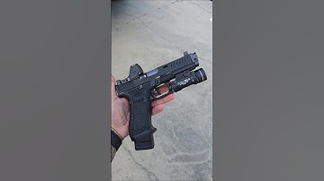Custom gen 5 Glock 17 with Radian Ramjet trijicon RMRhd Timney trigger tlr-1hlx light stippling