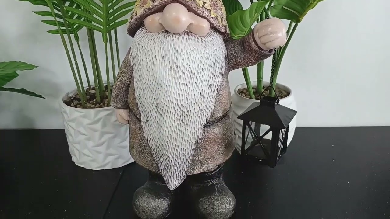 A gnome ornament with a solar lamp