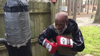 30 second burnouts on heavy bag wearing a 40lb weighted vest