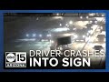 Driver crashes into large sign on I-10 in Phoenix