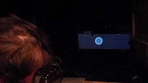 Video projecting a moving target for rifle shooting