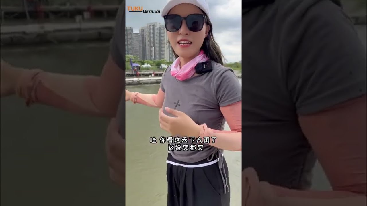 Cần thủ nữ câu cá rô phi, nhịp phao rất