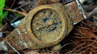 A talented craftsman restoration a rusty Rolex Day-Date watch