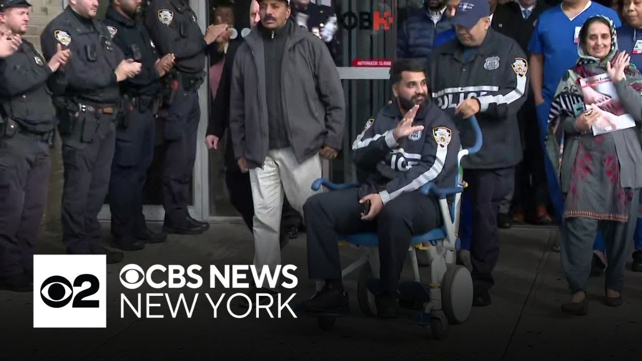NYPD officer leaves hospital after being shot in Brooklyn - YouTube