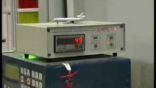 NCS/A PROFESSIONAL tab inserter on bag machine