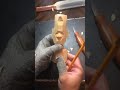 Dwayne Gosnell carving a face