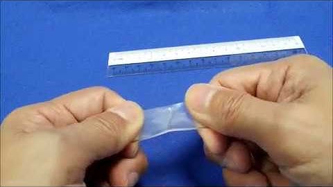 Testing of the shape memory effect in a rubber-like shape memory polymer